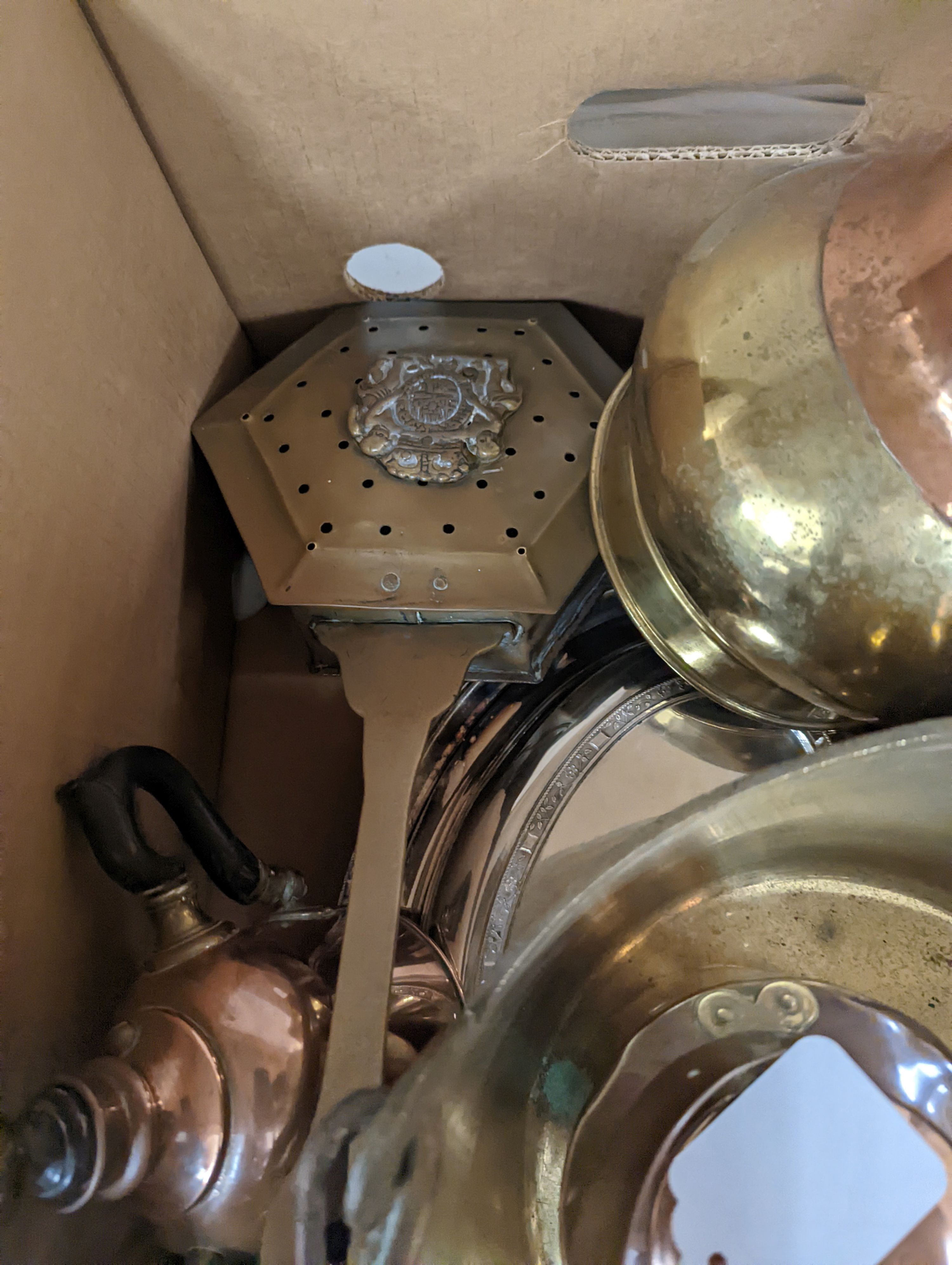 A quantity of copper and brass wares